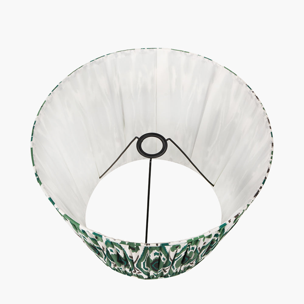 Green and white patterned lampshade with a black metal frame and a circular top view.