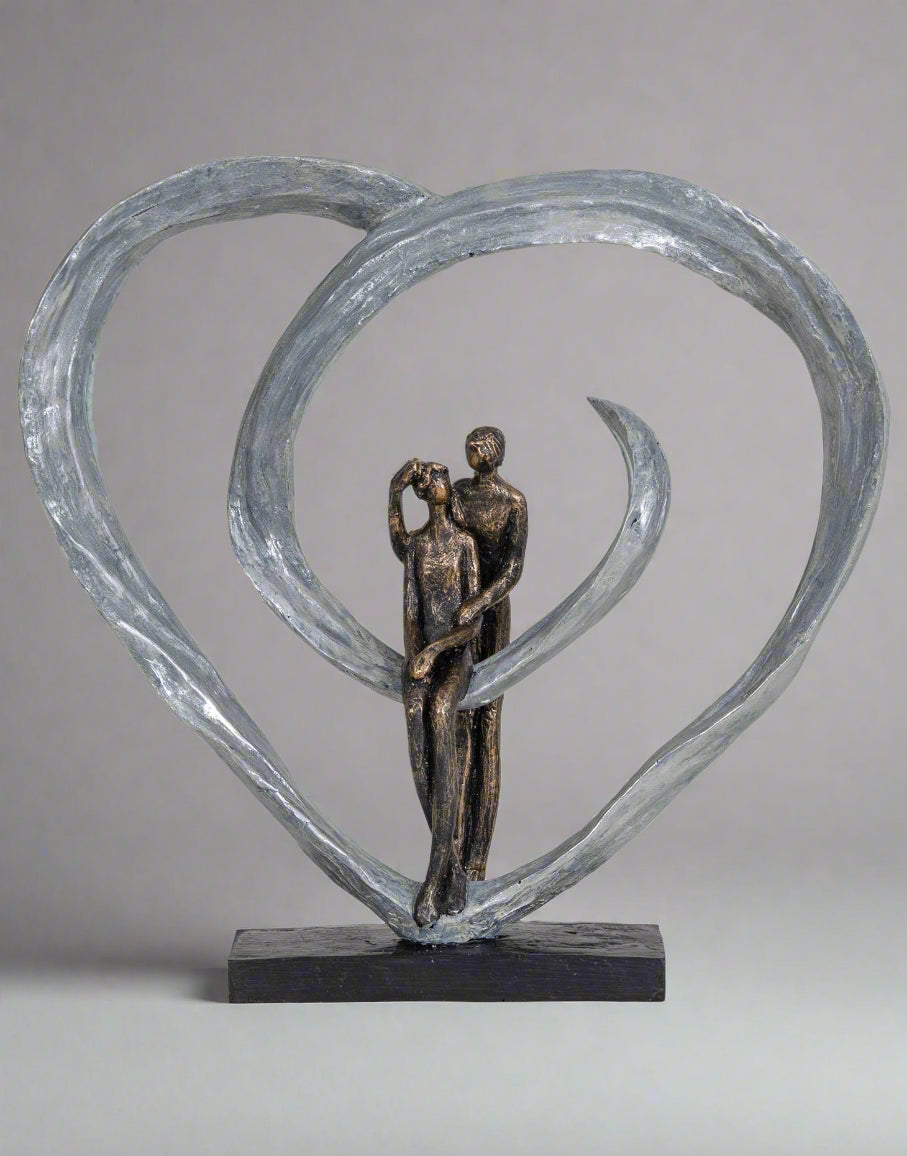 Love Sculpture in Circular Heart – Bronze | Woodcock and Cavendish