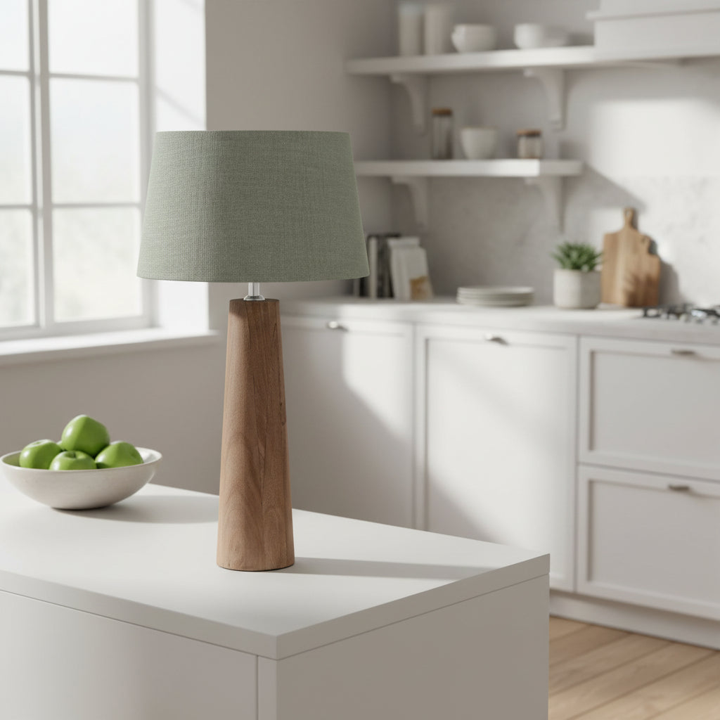 Table lamp with wooden base and gray fabric shade on a white background