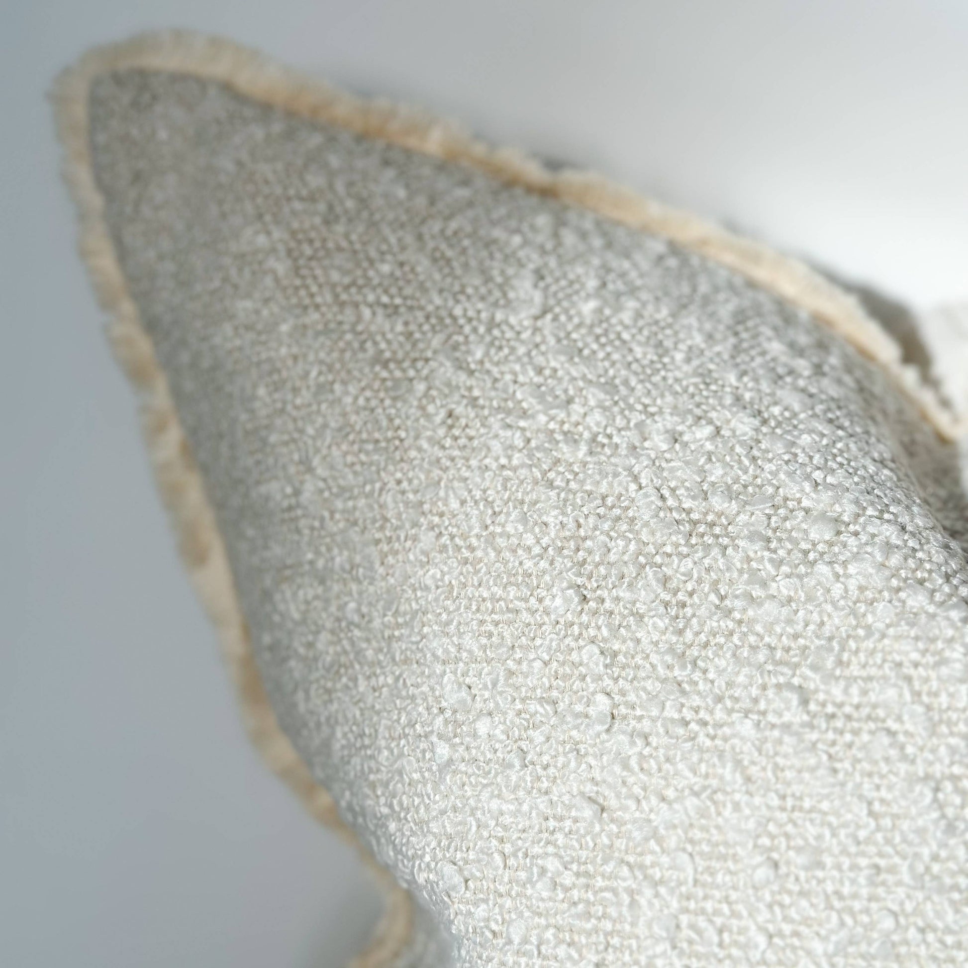 Cream Bouclé Cushion with Feather Pad – 45 x 45cm | Fringed Edge