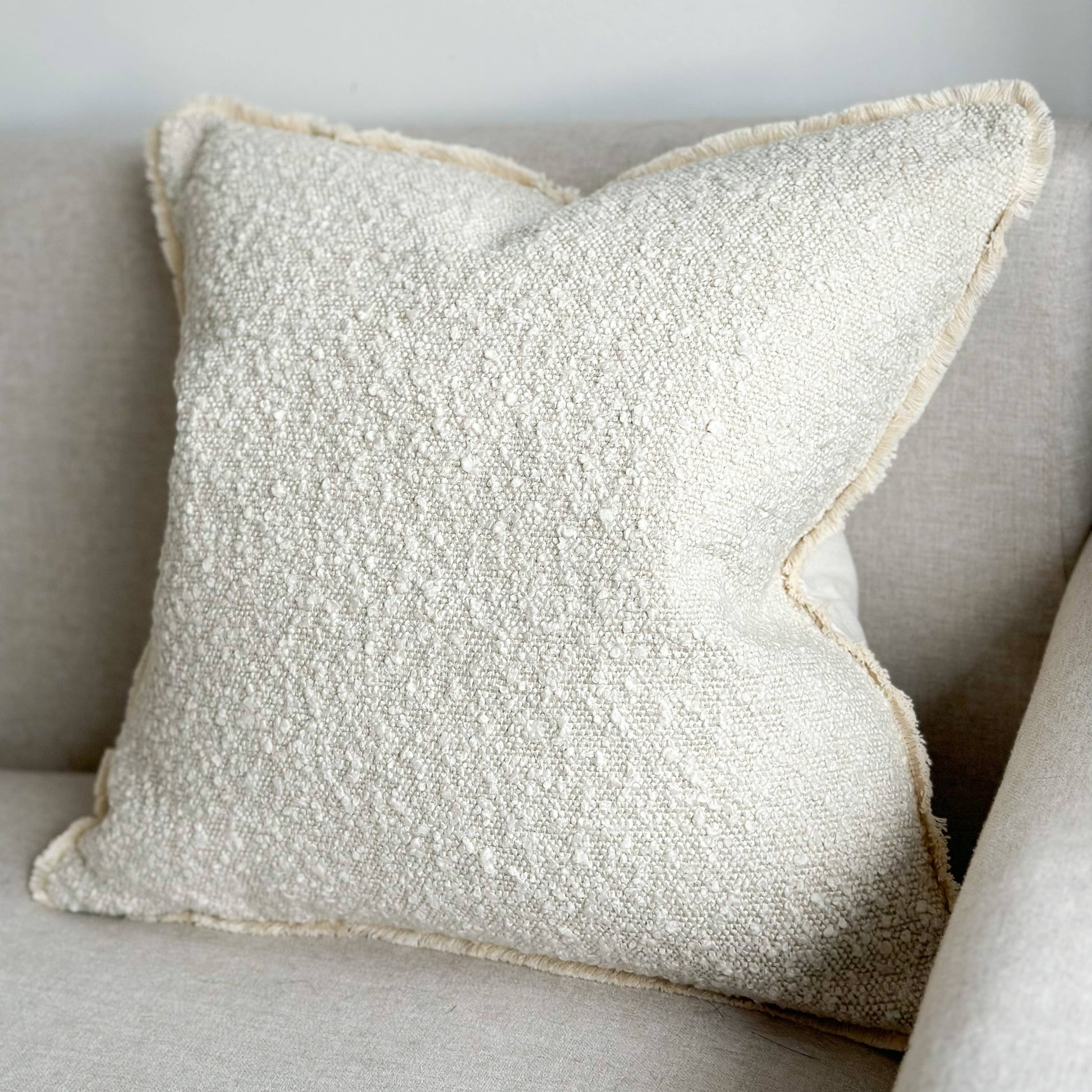Cream Bouclé Cushion with Feather Pad – 45 x 45cm | Fringed Edge