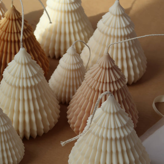 Shell-shaped decorations with a ribbon on a neutral background, featuring the brand 'Jeune Home'.