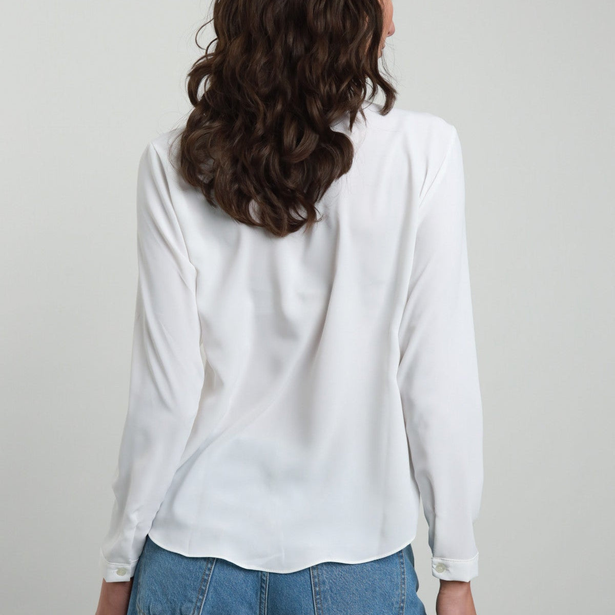 V-Neck Blouse with Ruffles and Front Slit – Elegant and Feminine