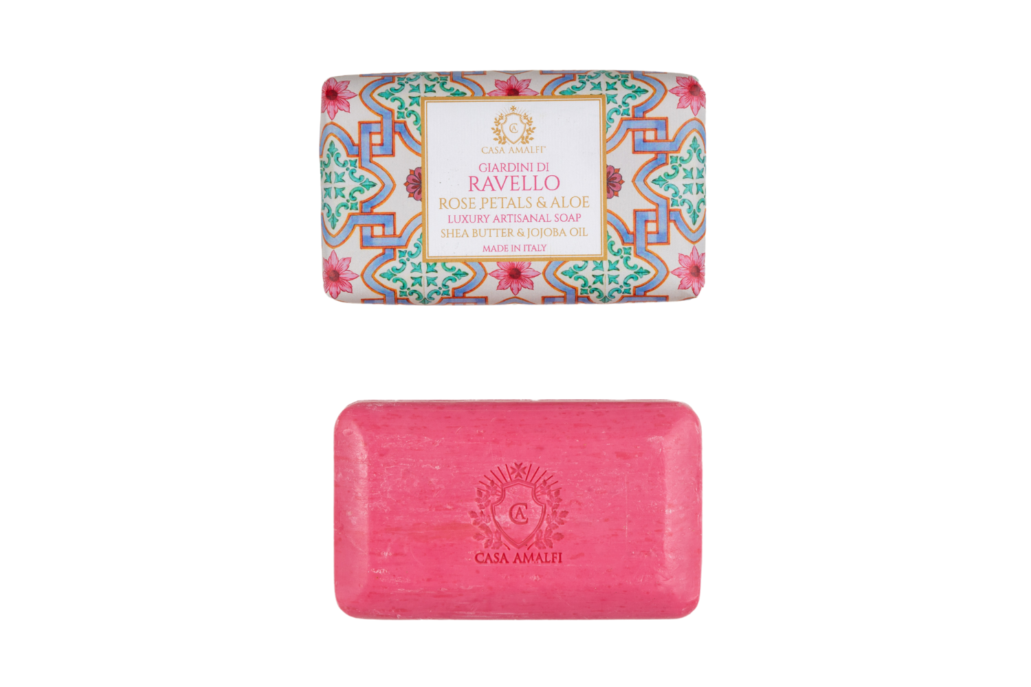 Pink soap bar with decorative packaging on a white background