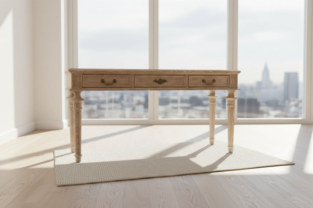 140cm natural wood console table with three drawers and a lower shelf, styled in a bright hallway.