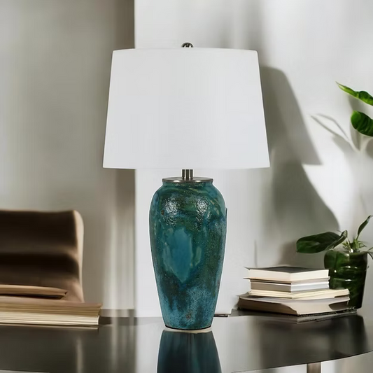 Add serene coastal charm to your space with our 67CM Aqua Ceramic Table Lamp. Featuring a glazed blue base and linen shade, it's perfect for modern or beach-inspired interiors.

