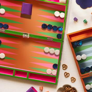 Backgammon game set with pieces and dice on a colorful board