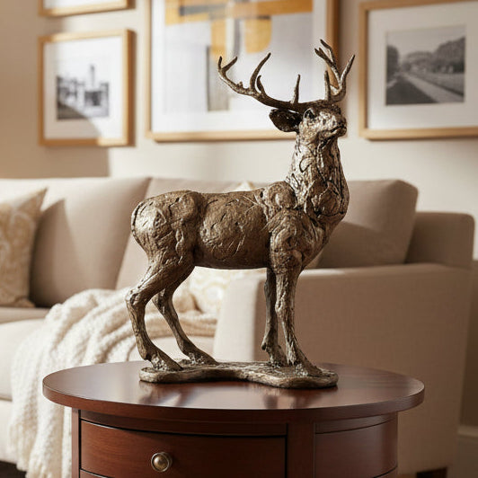 Living room with beige sofa, wooden coffee table, and decorative deer statue.