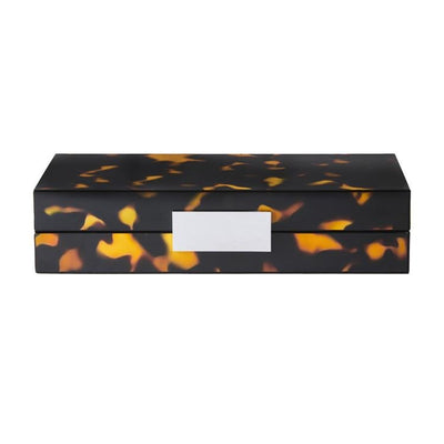 Tortoiseshell-patterned jewelry box with a white handle on a white background
