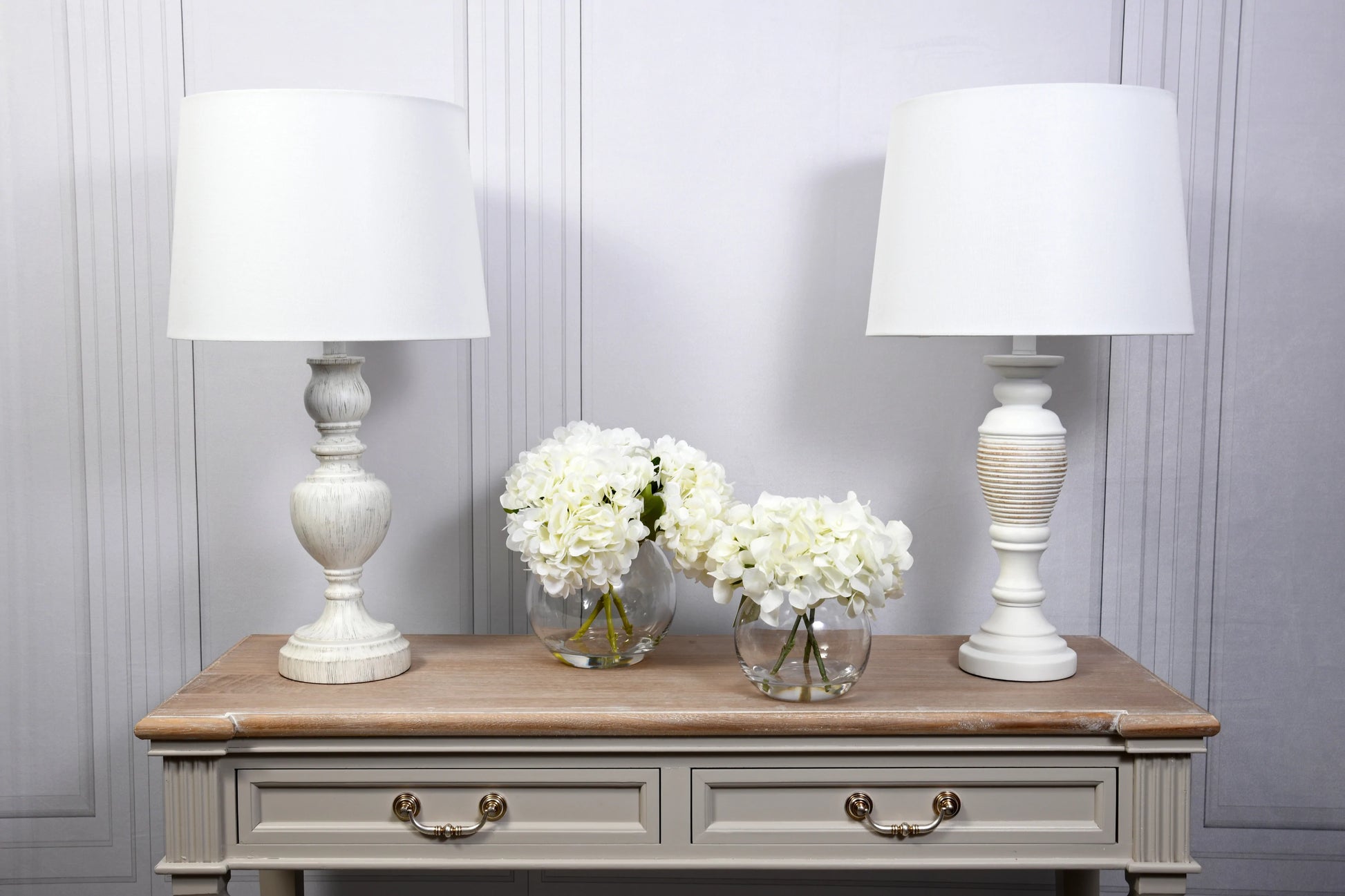 White Hydrangeas In Globe Vase for sale - Woodcock and Cavendish