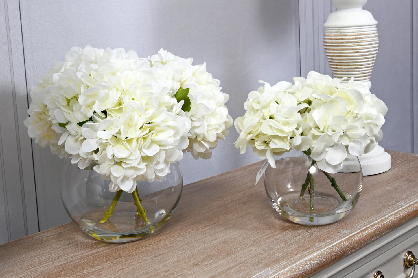 White Hydrangeas In Globe Vase for sale - Woodcock and Cavendish