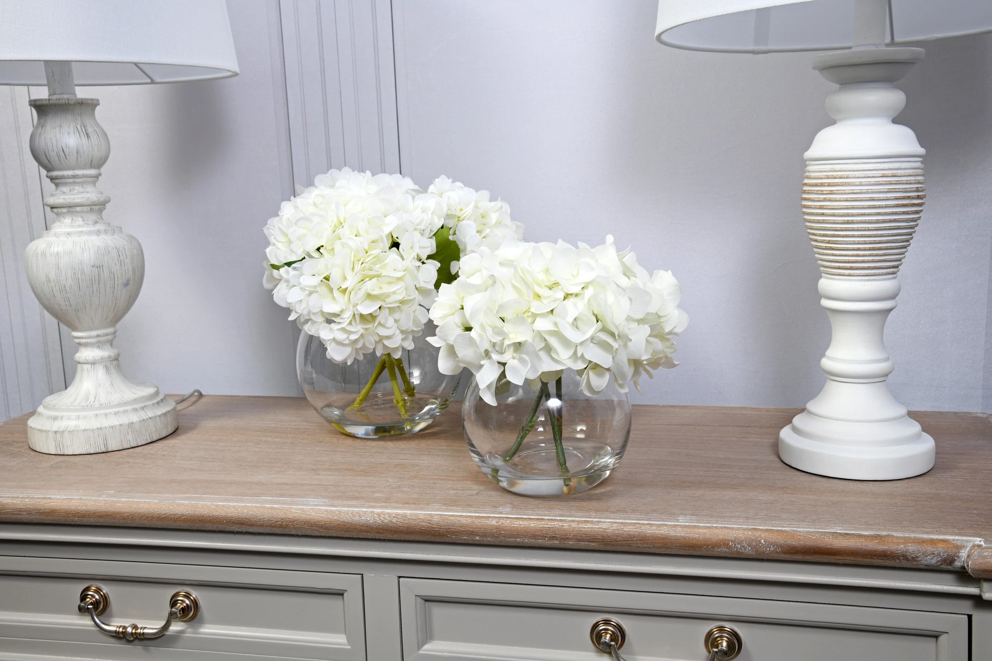 White Hydrangeas In Globe Vase for sale - Woodcock and Cavendish