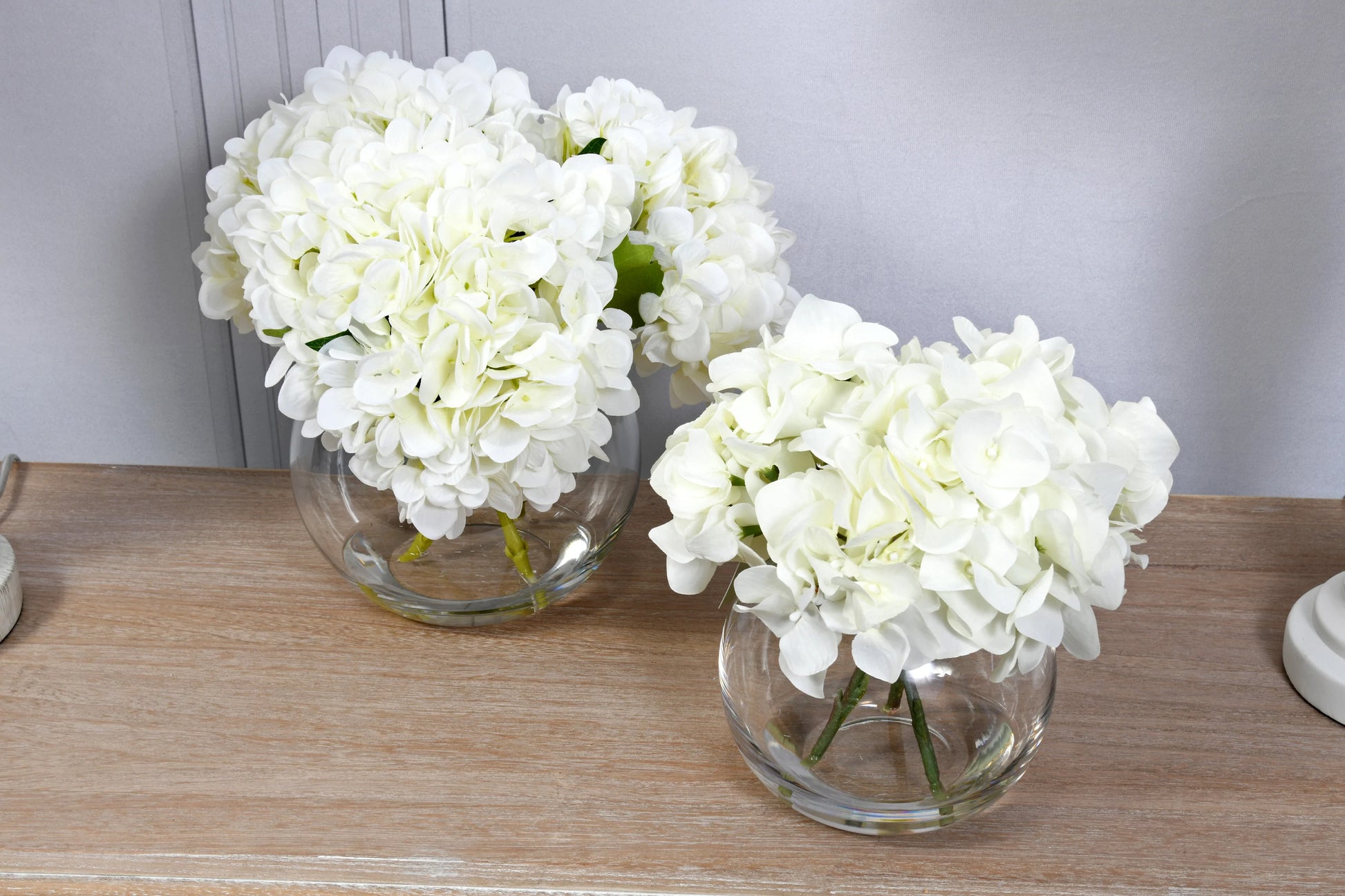 White Hydrangeas In Globe Vase for sale - Woodcock and Cavendish